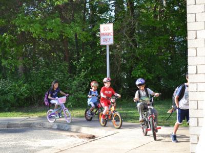 students biking to school