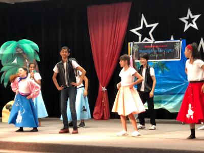 students performing Grease